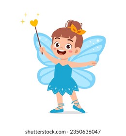 little kid wearing fairy costume and feel happy