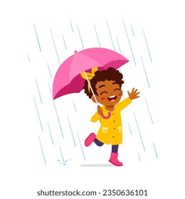 little kid wearing yellow rain coat in the rain and feel happy