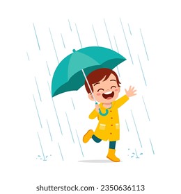 little kid wearing yellow rain coat in the rain and feel happy