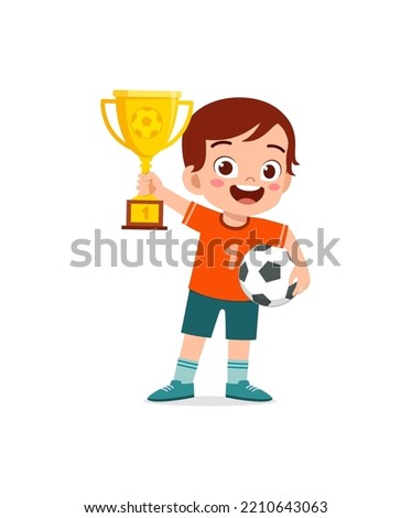little kid win soccer competition and holding trophy