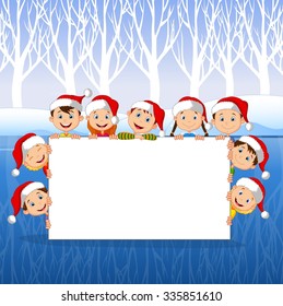Little Kids with a blank sign and christmas hats
