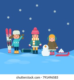 Little kids in colorful clothes playing at winter outdoors. Group of children in the winter