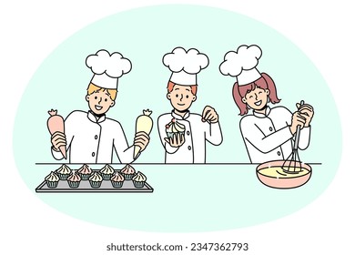 Little kids cooks have fun baking together. Smiling small children in uniforms cooking preparing desserts at kitchen. Workshop or future profession. Vector illustration.