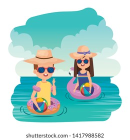 little kids couple with floats and balloons in the sea