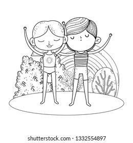 little kids couple in the garden with rainbow