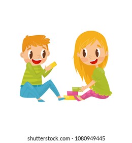 Little kids playing with colorful cubes. Brother and sister having fun together. Colorful flat vector design
