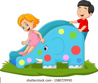 Little kids playing on elephant slide