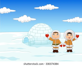 Little kids wearing traditional eskimo costume with igloo house background 