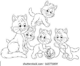 Little kittens playing with their mommy cat