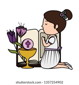 little kneeling girl with bible and flowers first communion