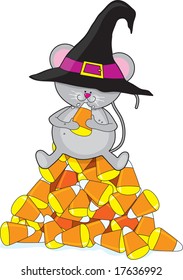 A little mouse sitting on top of  a pile of Halloween candy corn.
