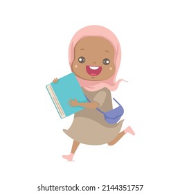 Little Muslim girl holding a book and smiling