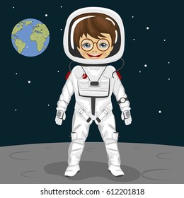 Little nerd boy astronaut standing on the moon surface on backround of earth