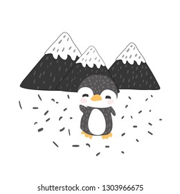 Little penguin stands. Against the backdrop of the mountains.