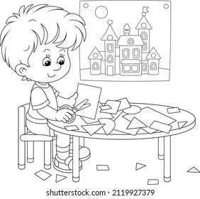 Little preschool child cutting outlines and figures from color paper with scissors and making a funny picture of a pretty toy town, black and white outline vector cartoon illustration for a coloring b