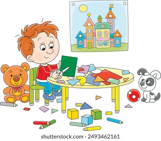 Little preschool child cutting outlines and figures from color paper with scissors and making a funny picture of a pretty toy town, vector cartoon illustration isolated on a white background