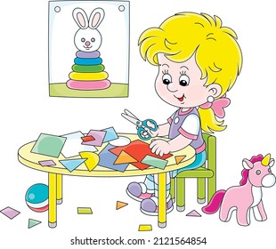 Little preschool girl cutting outlines and figures from color paper with scissors and making a funny picture of a cute toy bunny, vector cartoon illustration isolated on a white background