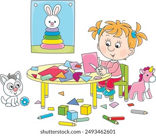 Little preschool girl cutting outlines and figures from color paper with scissors and making a funny picture of a cute toy bunny, vector cartoon illustration isolated on a white background