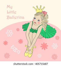 Little princess ballerina sitting in a green tutu.