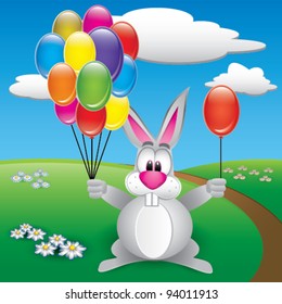 little rabbit with colorful balloons on a green meadow