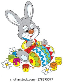 Little rabbit coloring a big Easter egg
