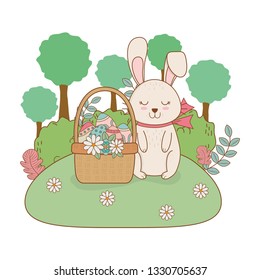 little rabbit with egg painted in basket on the garden