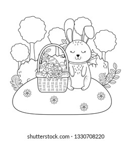 little rabbit with egg painted in basket on the garden