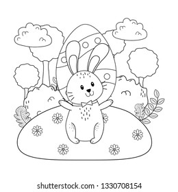 little rabbit with egg painted in the garden