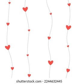 little red hearts hanging on strings 