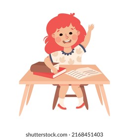 Little Redhead Girl Pupil Sitting at Table with Book and Raising Hand Engaged in Elementary Education Vector Illustration