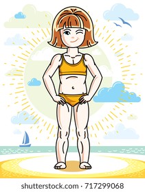 Little redhead girl toddler standing on sunny beach and wearing swimming suit. Vector kid illustration. Summer holidays theme.