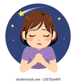 Little sad crying girl praying for wish at night