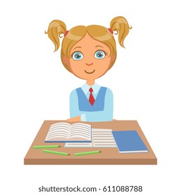 Little schoolgirl sitting at the desk with notebooks, a colorful character