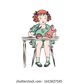 Little seamstress sews dress sitting at table and holding scissors in her hands.
