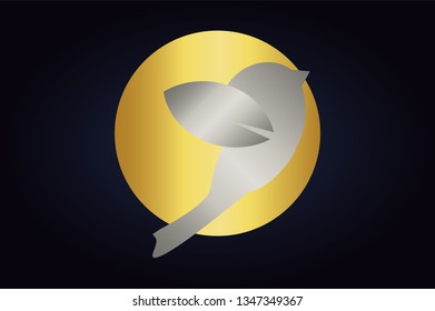 Little Silver bird silhouette near the golden sun. Gold circle behind the flying bird. Bird logo for web and print.