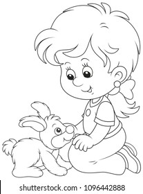 Little smiling girl playing with her small rabbit, black and white vector illustration in a cartoon style for a coloring book