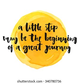 A little step may be the beginning of a great journey. Inspirational quote, positive saying.  Modern calligraphy text, handwritten with brush and black ink on yellow watercolor stain