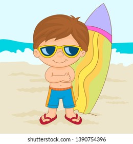 Little surfer posing next to his surfboard on the beach