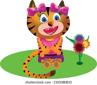 little tiger girl looks at flowers