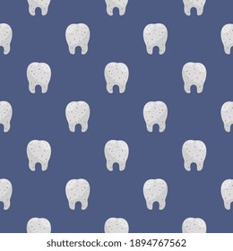 Little tooth , seamless pattern on a blue background.