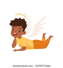 Little Winged African American Boy With Halo on His Head Lying on Floor Vector Illustration