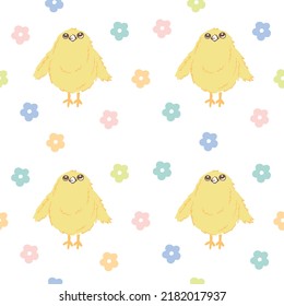 Little yellow chicks and calico print of colorful flowers. Cute delicate print for fabric and paper printing.