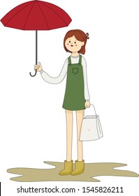 A little young girl in a green overalls stands under a big red umbrella for autumn rainy weather. Vector cartoon illustration. Isolated on white background