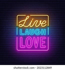 Live Laugh Love Neon Quote On Brick Wall Background.