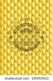 Live a Life of Adventure gold emblem or badge. Scales pattern. Vector Illustration. Detailed.