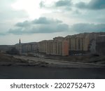 Living blocks and mosque under construction in south-eastern Turkey. Vector image.