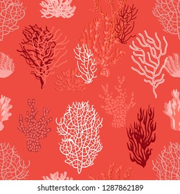 Living corals and seaweed in the sea. Seamless vector pattern with different shapes. Trendy 2019 color palette. Red, pink, white.