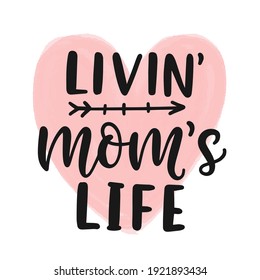 Living mom's life hand written modern calligraphy, Mother's Day gift card. Ink brush lettering on watercolour heart background. Poster, greeting card, mug, t shirt print design. Vector illustration.