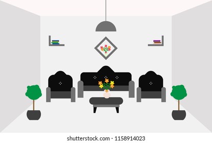 Living room decorated with black sofa, tree lamp, vase and book.