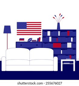 Living room interior with white walls, navy carpeting, sofa, floor lamp, coffee table, chest of drawers, shelving, books, magazines, newspapers, vase, flowers, ball and American flag on the wall